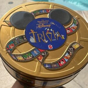 Disney Trivia Board game in gold tin complete with all pieces